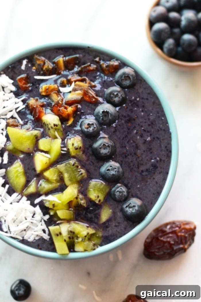 Vibrant Blueberry Smoothie Bowl 5 Smoothies are best eaten with a spoon! Make this thick and delicious Blueberry Date Smoothie Bowl and top it with all your favorite things for a quick breakfast or snack!
