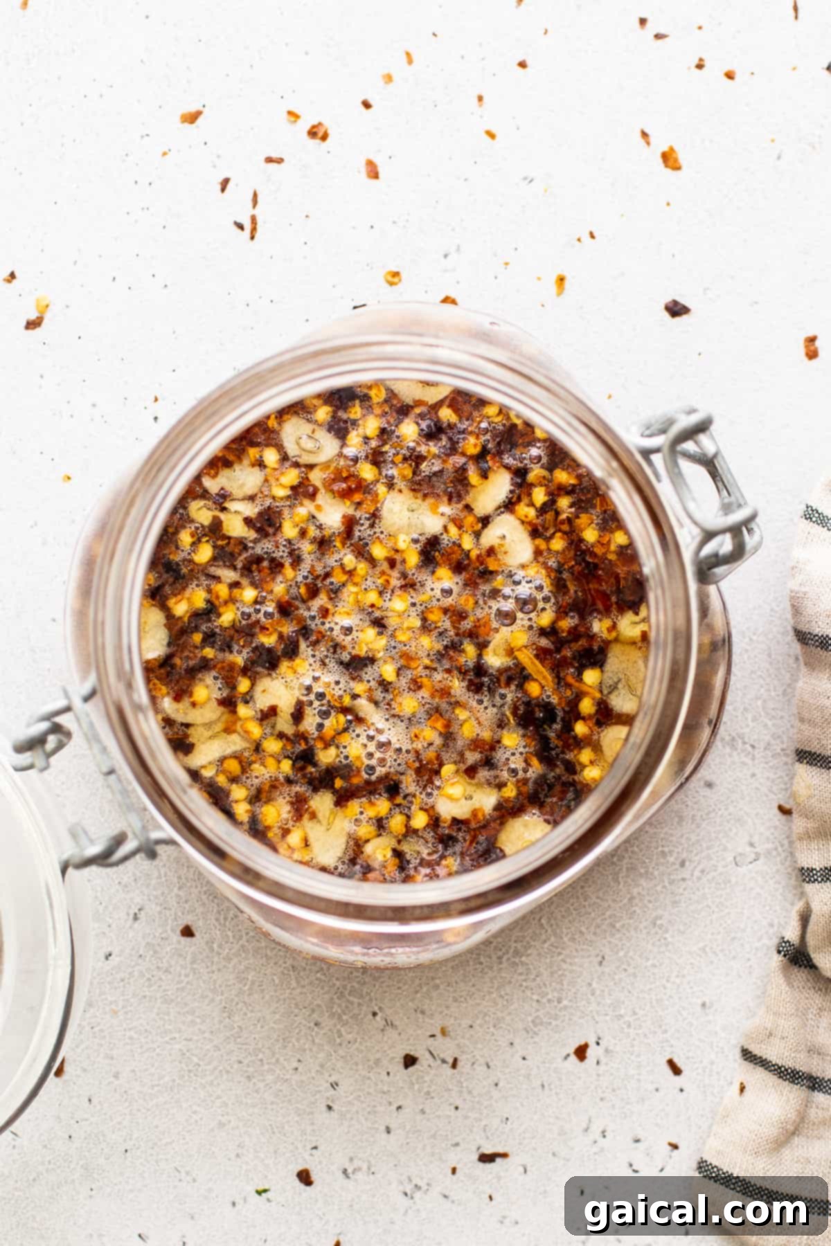 Our 4-ingredient hot honey sauce is hot, sticky and a little sweet. It's the perfect sauce to drizzle over chicken, seafood, pizza, roasted veggies and more! A stylish shot of hot honey in a jar, ready for use.