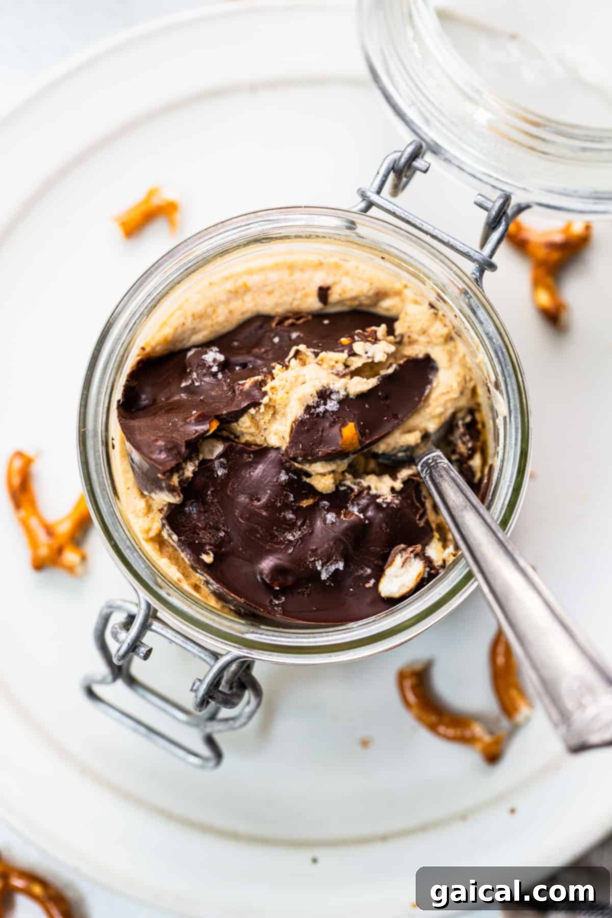 Easy Pumpkin Mousse with Chocolate Pretzel Topping Pumpkin mousse in a jar topped with chocolate pretzel crack topping.