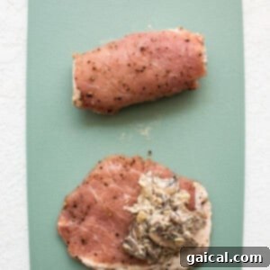 Process of stuffing a tenderized pork chop with savory mushroom filling.