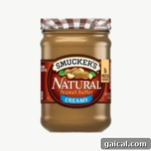 Fit Foodie Cooking March 2023 Session 3 A jar of Smucker's All-Natural Peanut Butter, perfect for baking.