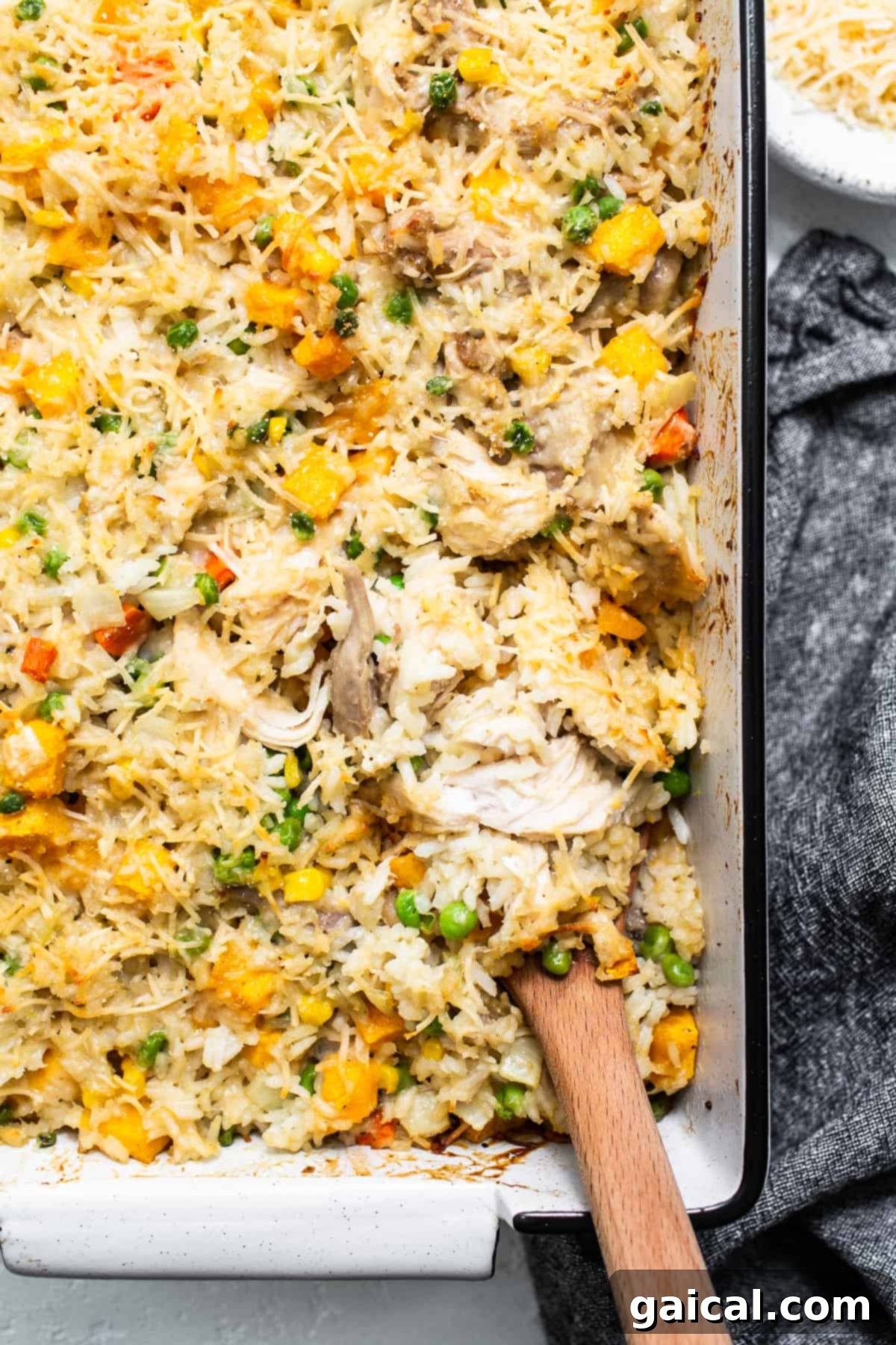A freshly baked turkey casserole, rich and golden, in a casserole dish.