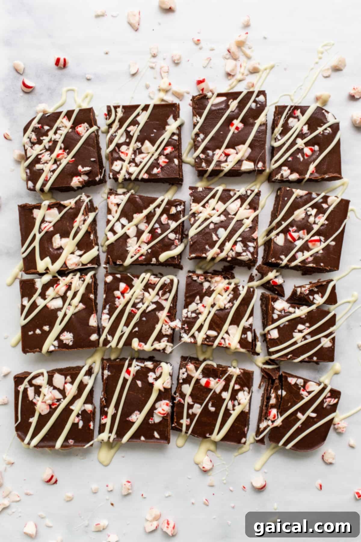 Arctic Peppermint Fudge 7 Perfectly sliced peppermint freezer fudge pieces, arranged for serving at a holiday gathering.