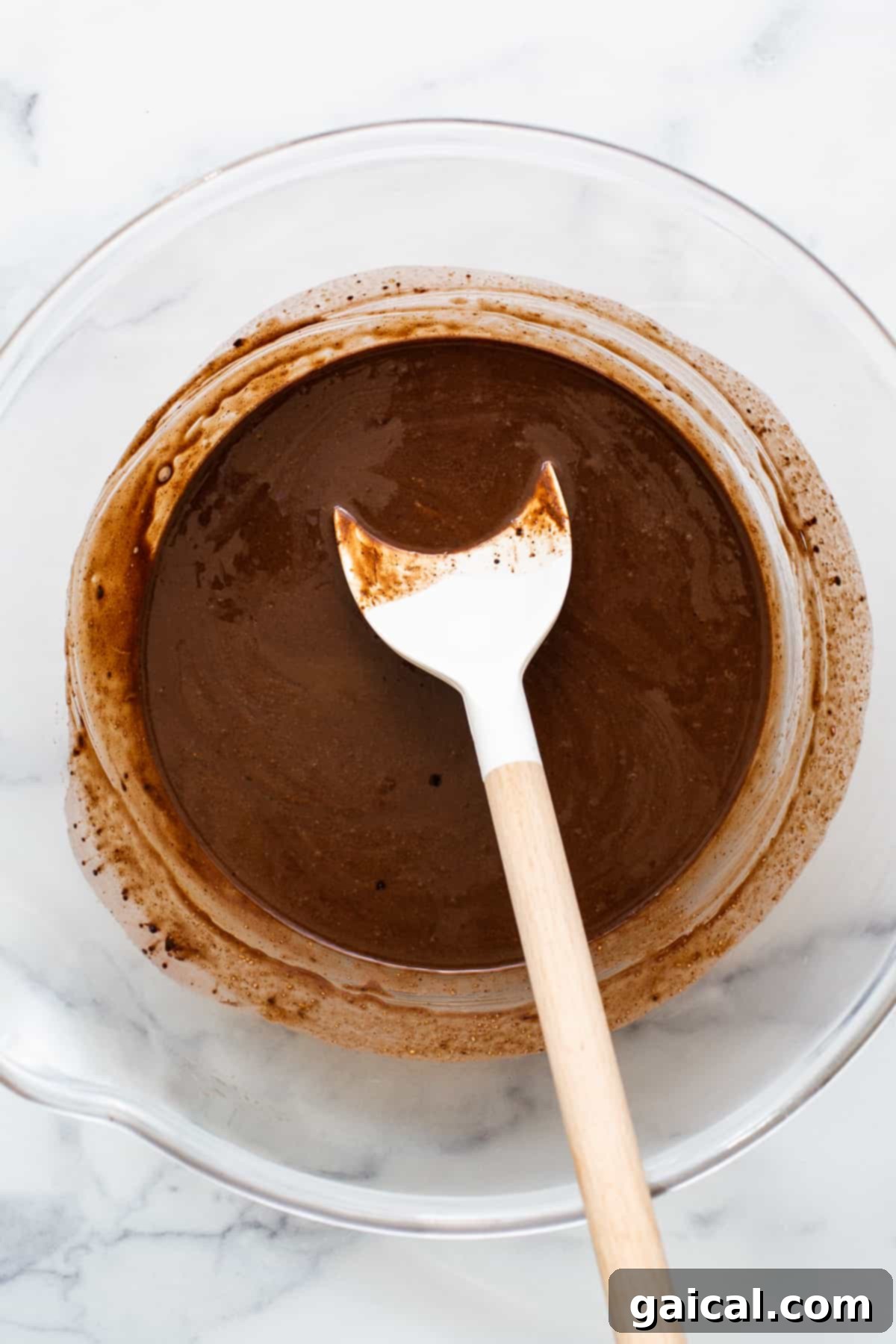 Arctic Peppermint Fudge 5 Melted freezer fudge mixture in a bowl, showing a smooth and creamy consistency before freezing.