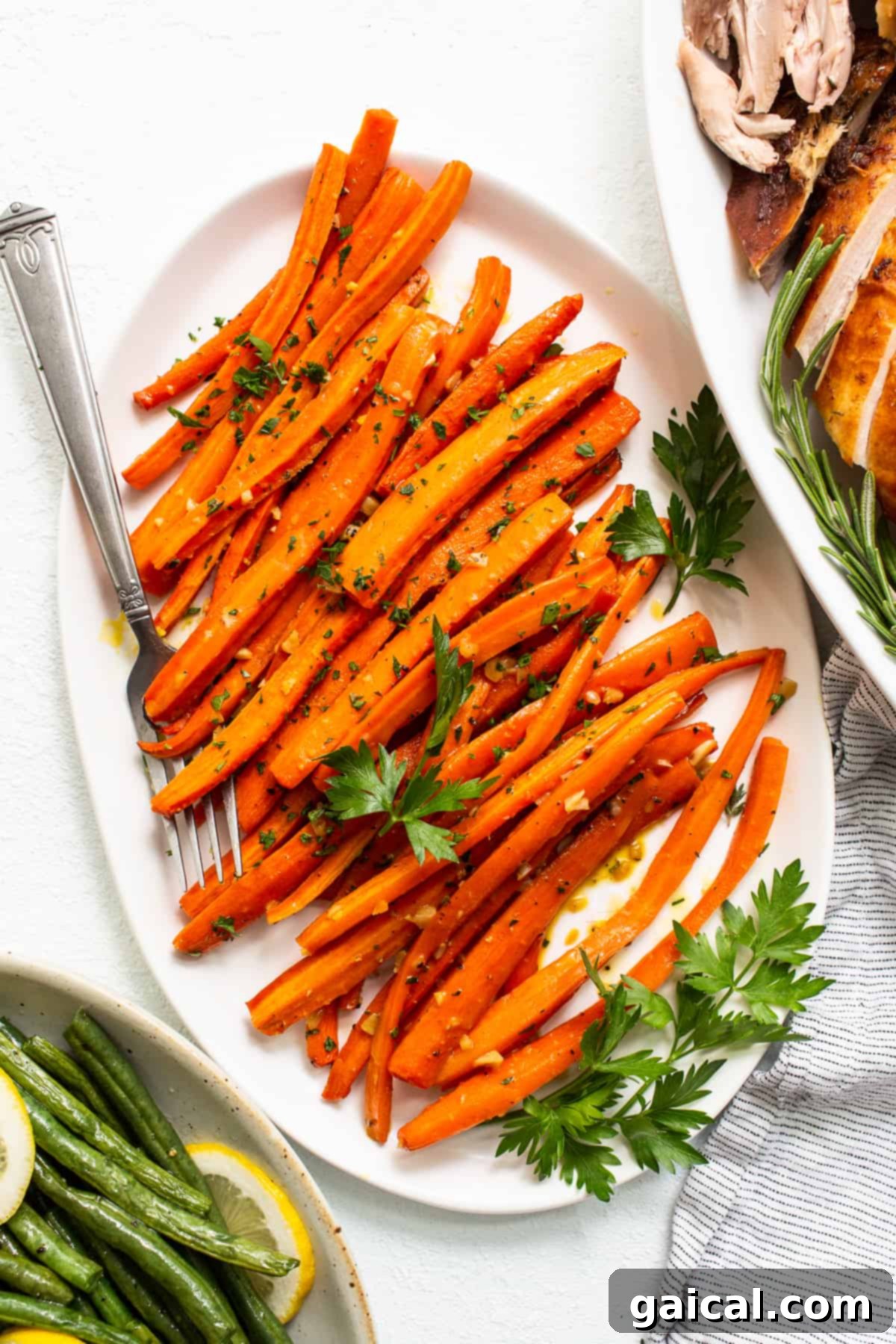 Delectable Garlic Glazed Carrots: Your New Favorite Side Dish A serving of beautifully roasted garlic glazed carrots on a white plate, ready to be enjoyed.