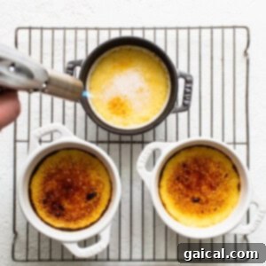 Torching the top of the Eggnog Crème Brûlée.