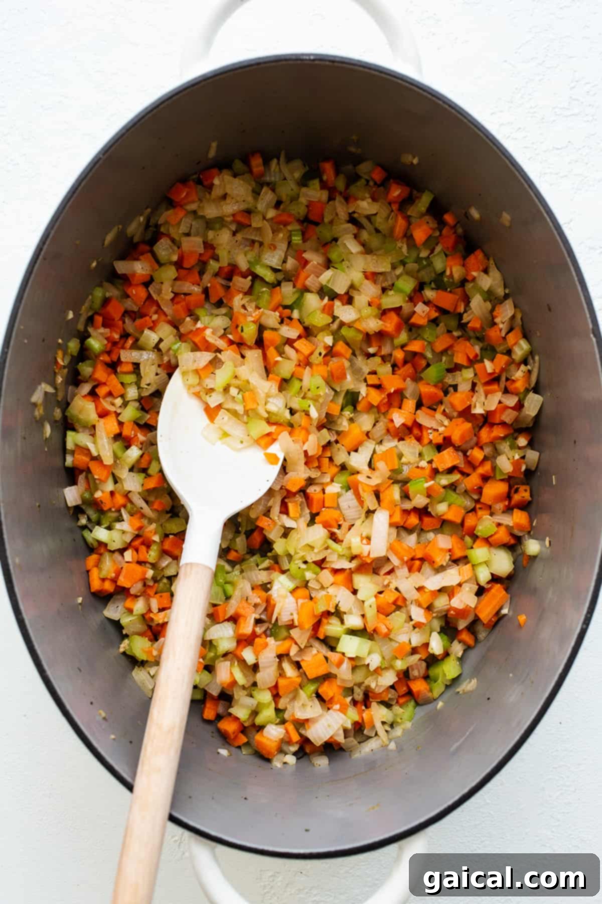 Soffritto: The foundation of a perfect bolognese. Finely minced white onions, carrots, and celery cooking in a large stock pot, forming the aromatic base for bolognese.