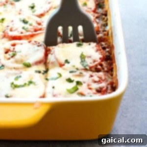 A close-up shot of the finished quinoa casserole in a baking dish.