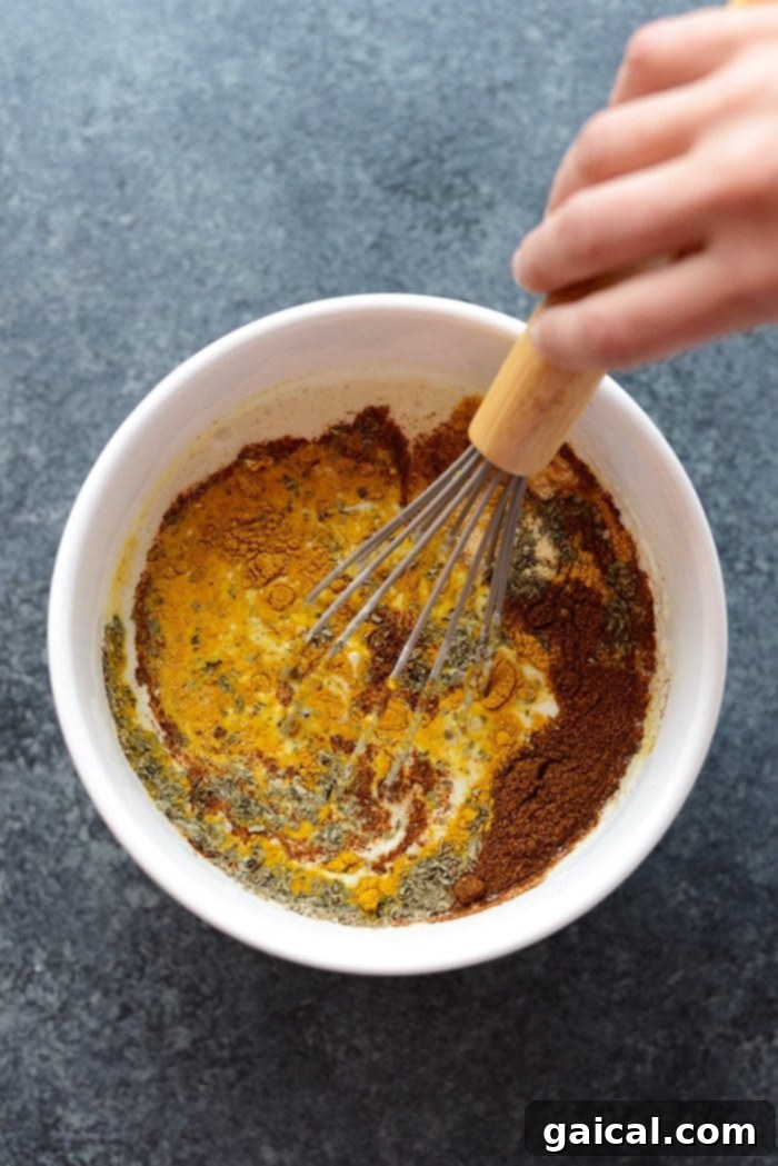 Close-up of the delicious Sweet Potato Green Curry Quinoa Casserole with vibrant colors and appetizing texture.
