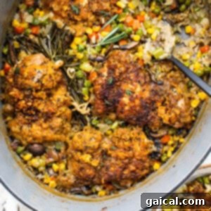 A pot of chicken and vegetables, freshly baked and ready.