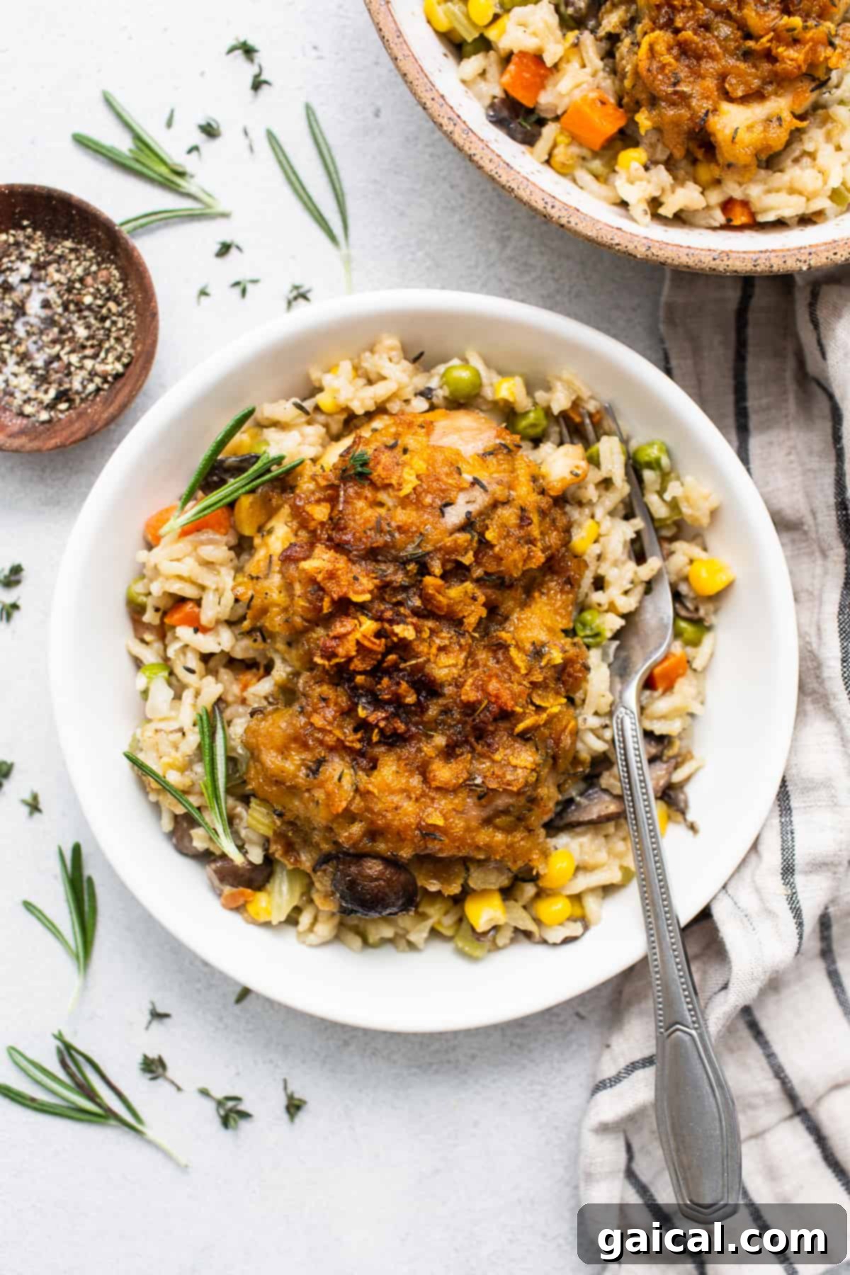 A single serving of chicken pot pie skillet in a white bowl, ready to be enjoyed.