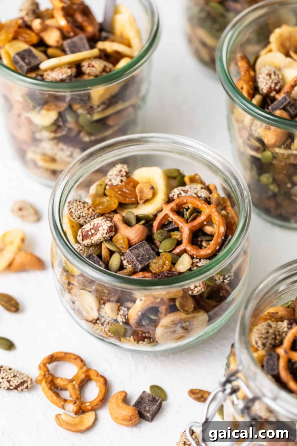 This healthy homemade trail mix is the perfect snack to satisfy all your sweet and salty cravings. Homemade trail mix in a jar.