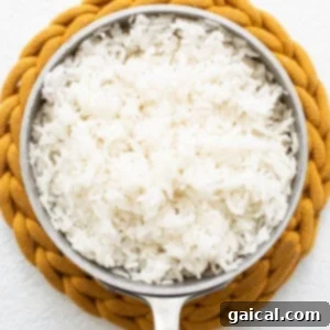 Spicy Korean Ground Chicken Bowls 10 Cooked rice in a pot, fluffy and ready.
