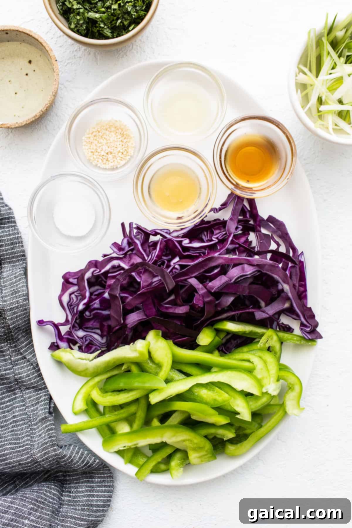 Spicy Korean Ground Chicken Bowls 3 Freshly sliced vegetables including bell peppers and cabbage, ready for the vibrant coleslaw.