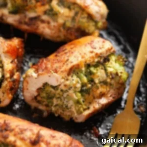 Spicy Korean Ground Chicken Bowls 7 Stuffed chicken breast on a cast iron skillet, golden brown and inviting.