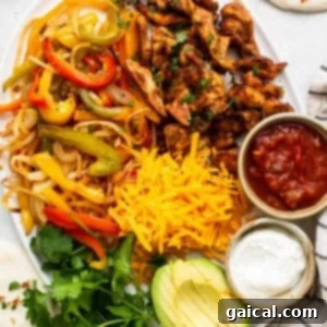 Platter of chicken fajitas ready to be served.