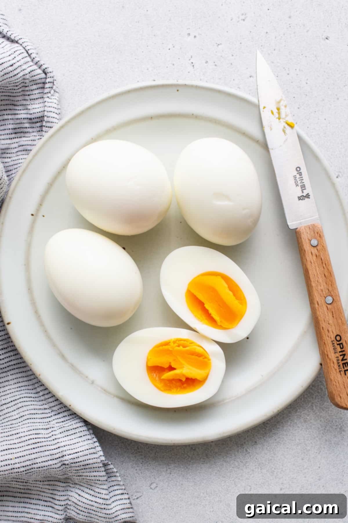 Peeled Air Fried Hard Boiled Eggs Ready to Serve A welcoming plate showcasing a collection of perfectly peeled hard boiled eggs, ready for consumption or further culinary use.