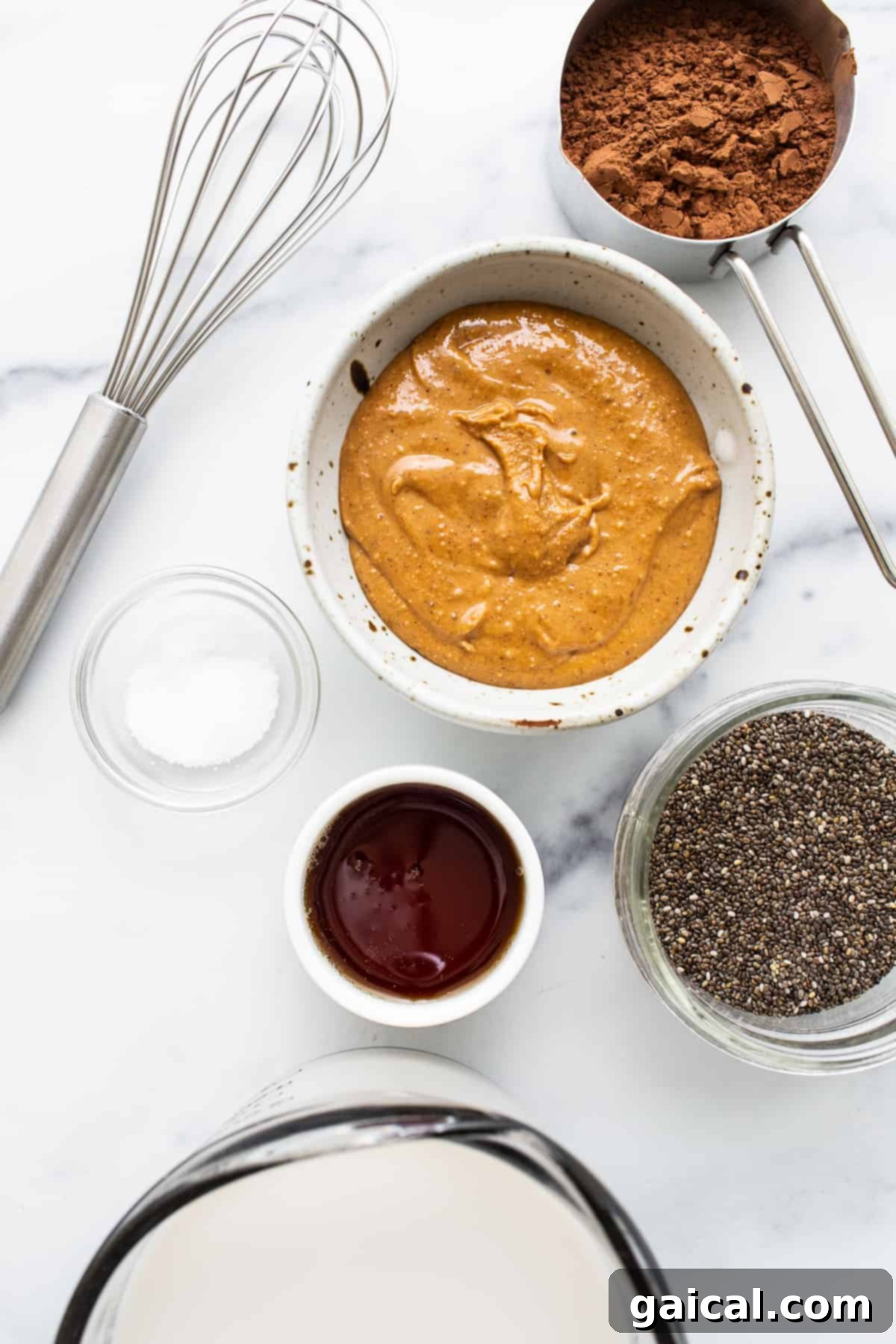 Wholesome Ingredients for Blended Chia Seed Pudding Ingredients for blended chia seed pudding laid out in bowls.