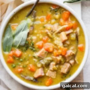 Hearty Ham and Split Pea Soup 15 Bowl of split pea soup with ham.