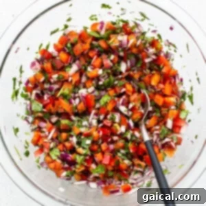 Morning Taco Delights 3 Freshly prepared pico de gallo in a glass bowl.