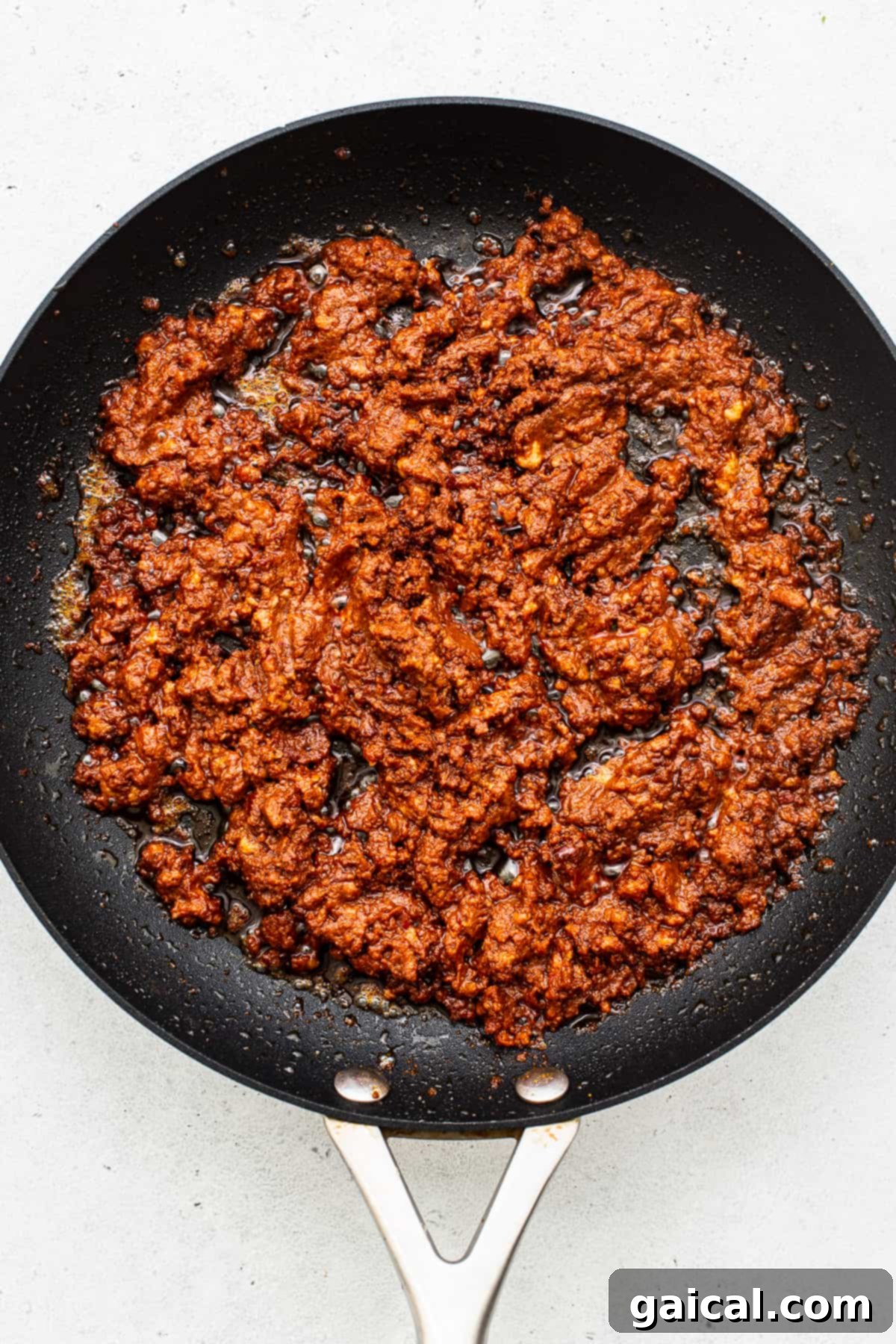 Flavorful Chorizo for Breakfast Tacos Crumbled cooked chorizo in a skillet, ready to be added to breakfast tacos.