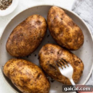 Poking holes in potatoes before cooking.