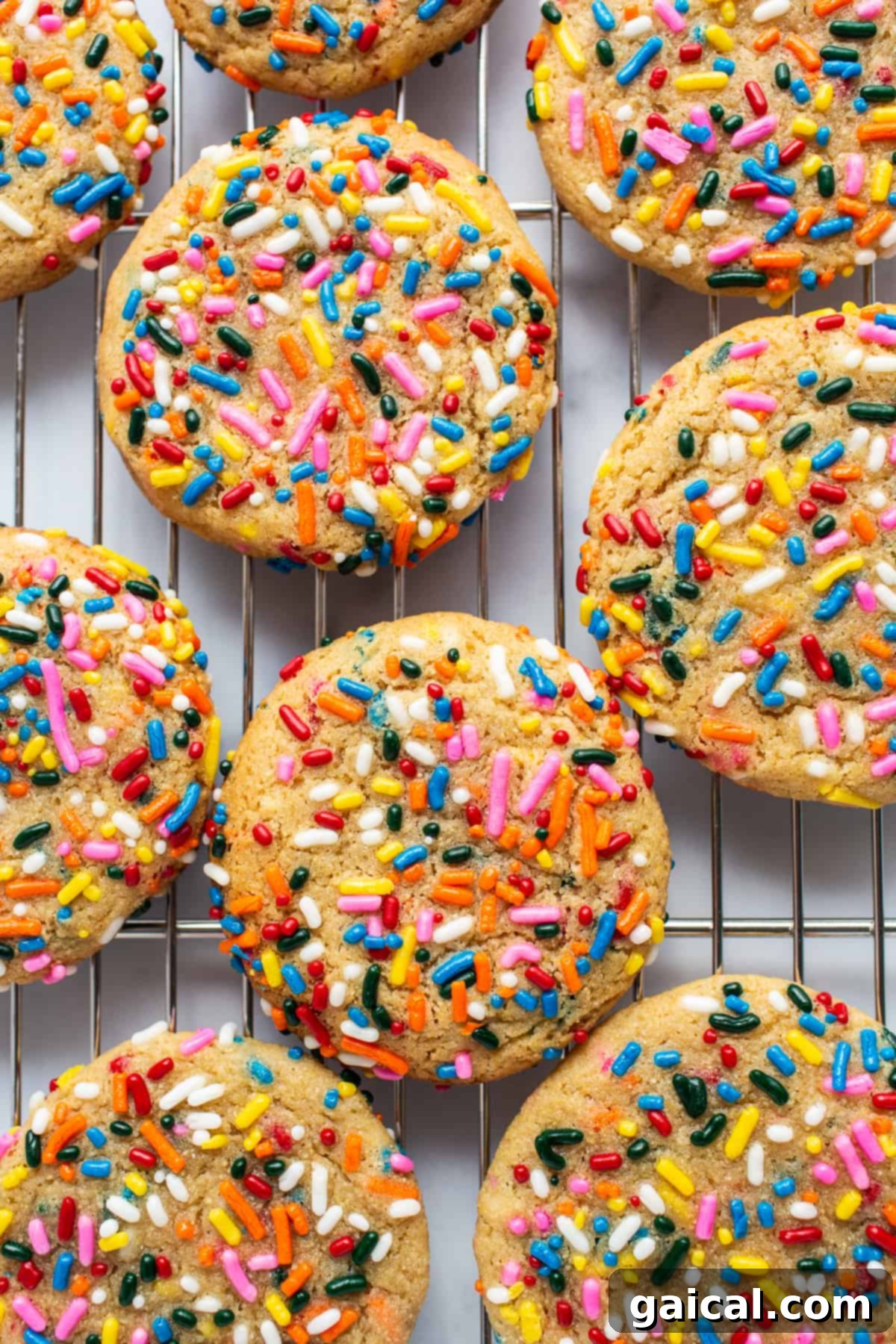 Chewy & Sweet Masa Cookies with Rainbow Sprinkles, inspired by Centro Minneapolis Colorful masa cookies cooling on a wire rack, showcasing their vibrant rainbow sprinkles and inviting texture.