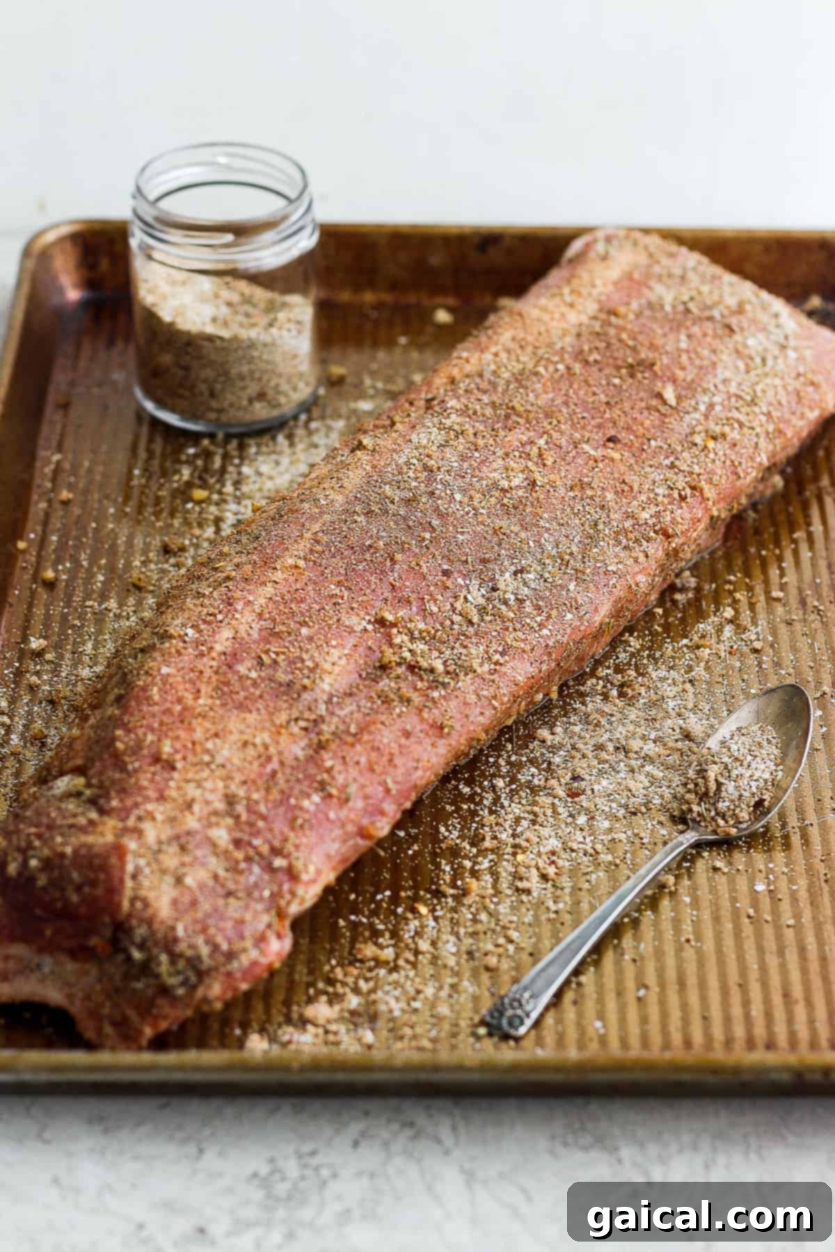 Seasoned Ribs Ready for Cooking Another close-up shot of a rack of ribs generously seasoned with the dry rub.