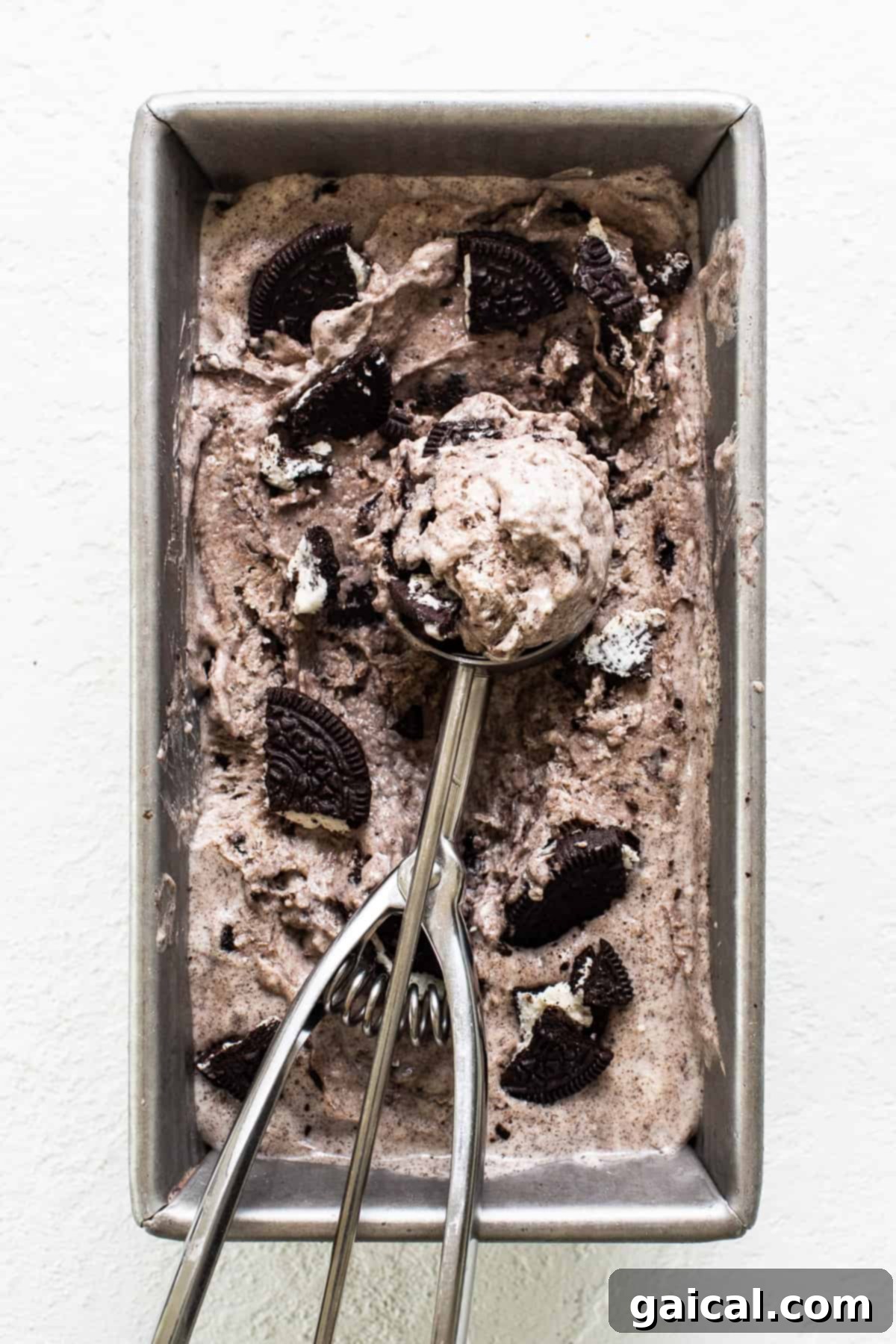 Cookies & Cream Protein Dream 8 Delicious cottage cheese ice cream with Oreo pieces in a loaf pan, ready for serving or more freezing.