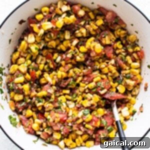 Sunshine Corn Salsa 11 Fresh corn salsa in a white bowl, ready for the final stir.