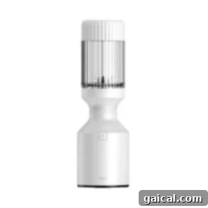 Sunshine Corn Salsa 2 A high-speed personal blender with a sleek design, perfect for making smoothies, dips, and sauces.