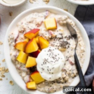 Golden Peach Overnight Bliss 10 A bowl of oatmeal with peaches and yoghurt.
