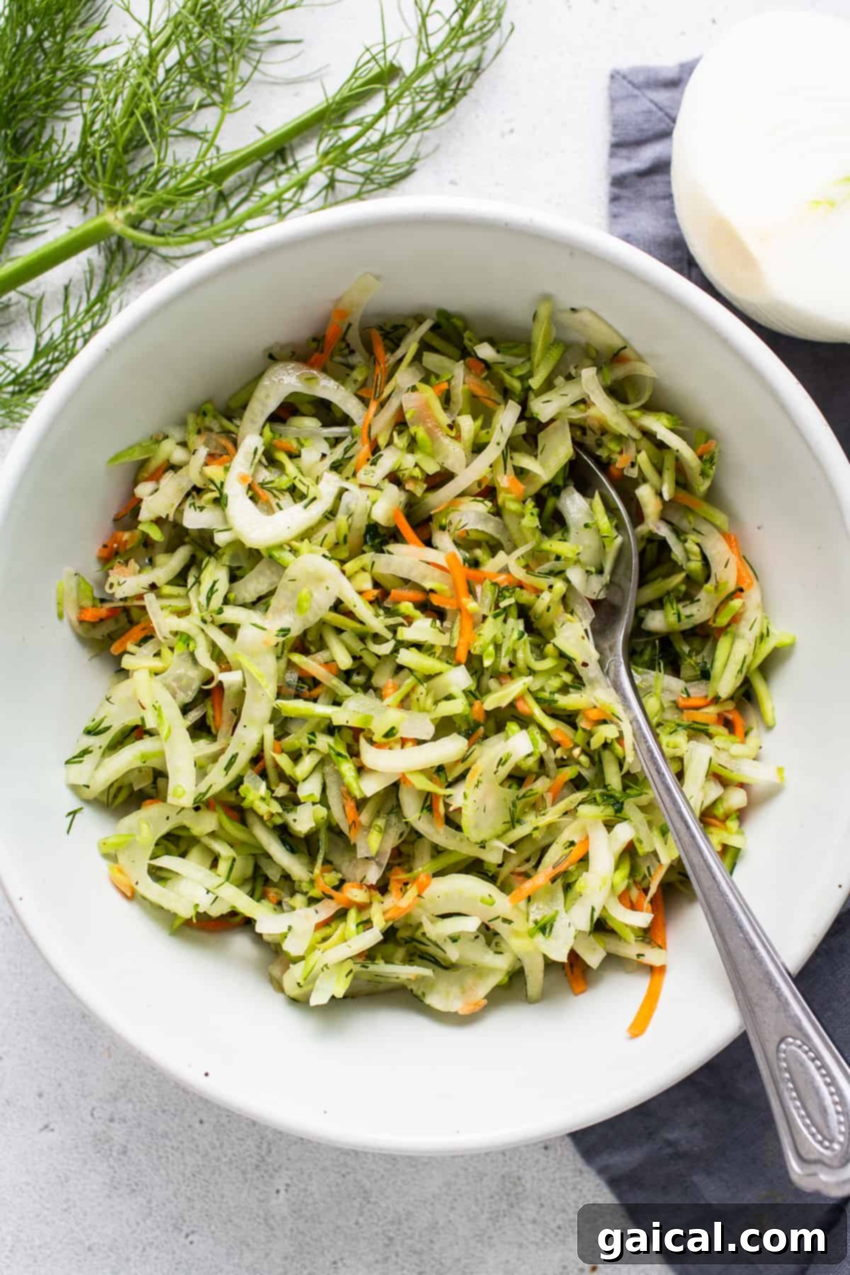 Crispy Air Fryer Fish Tacos 3 A bowl of dill slaw with carrots and onions.