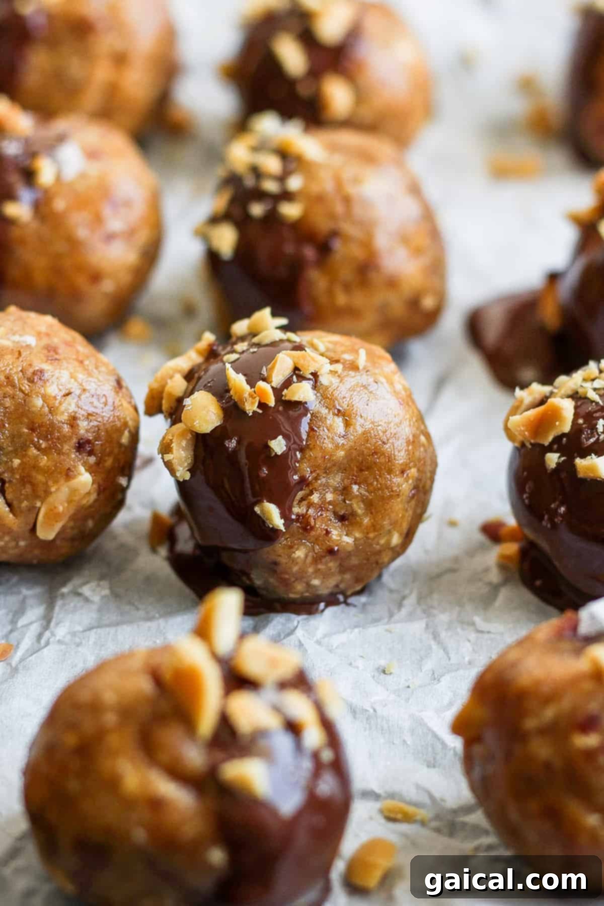 Autumn's Wholesome Kitchen Collective 8 Healthy peanut butter and chocolate bites arranged on a baking sheet, ready for chilling or serving.
