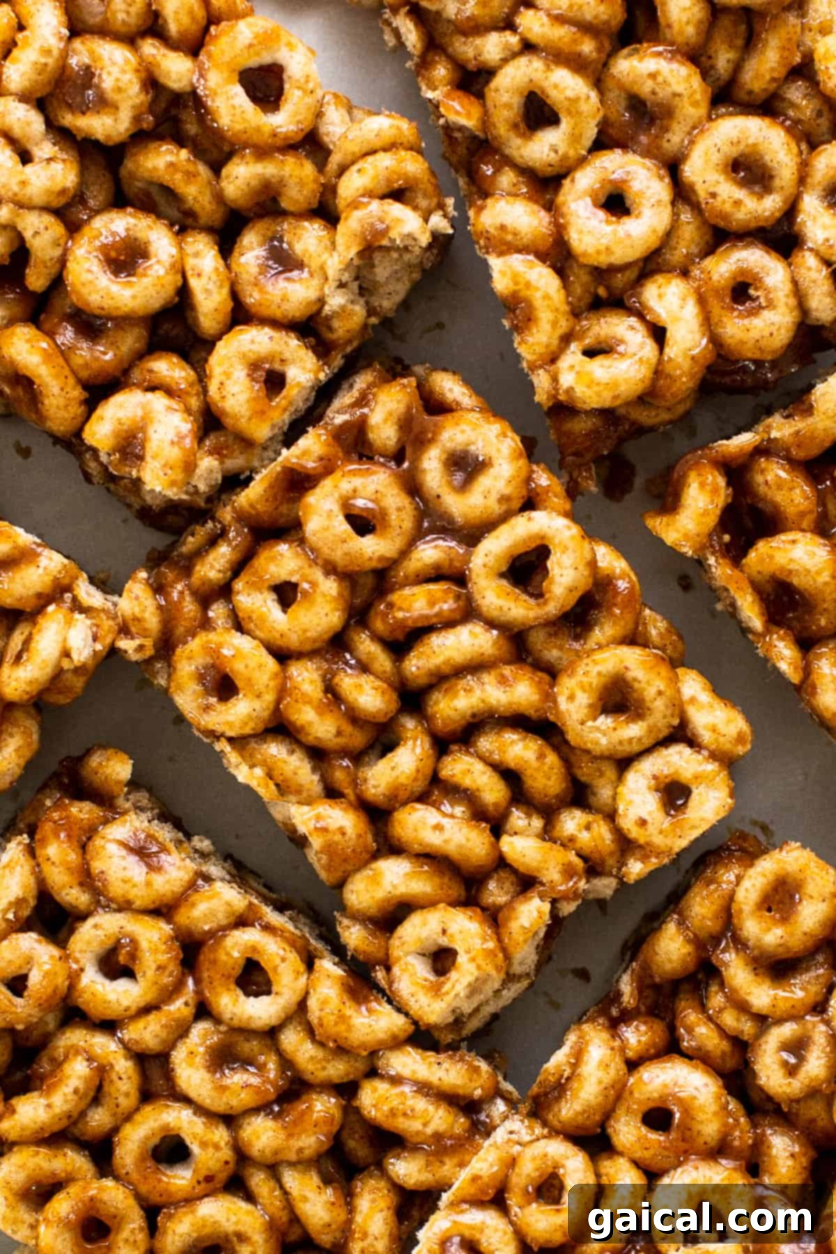 Pumpkin PB Cereal Bars 6 Cereal krispy bars are stacked on top of each other.