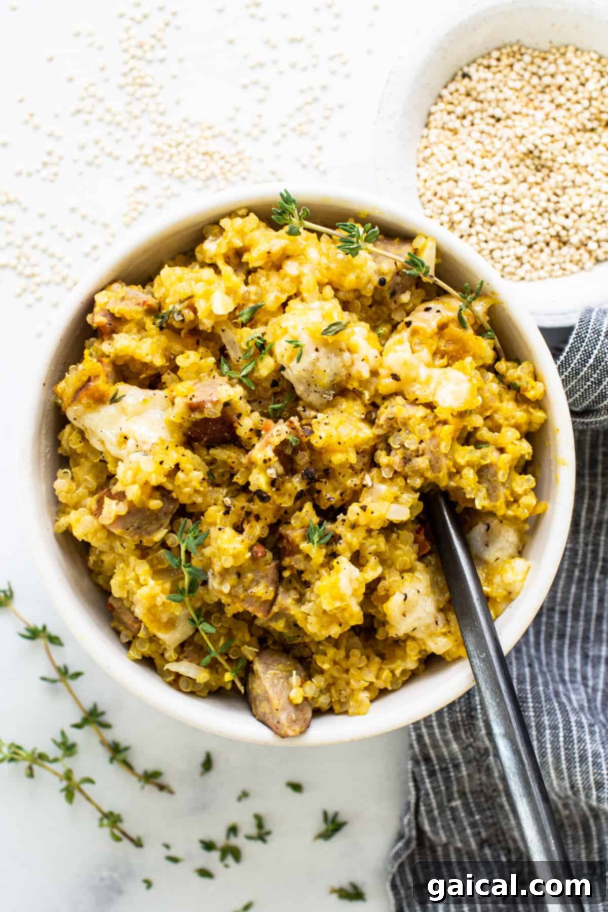 Hearty Butternut Chicken Sausage Quinoa Bake 7 A bowl of couscous with mushrooms and thyme, a perfect side dish.