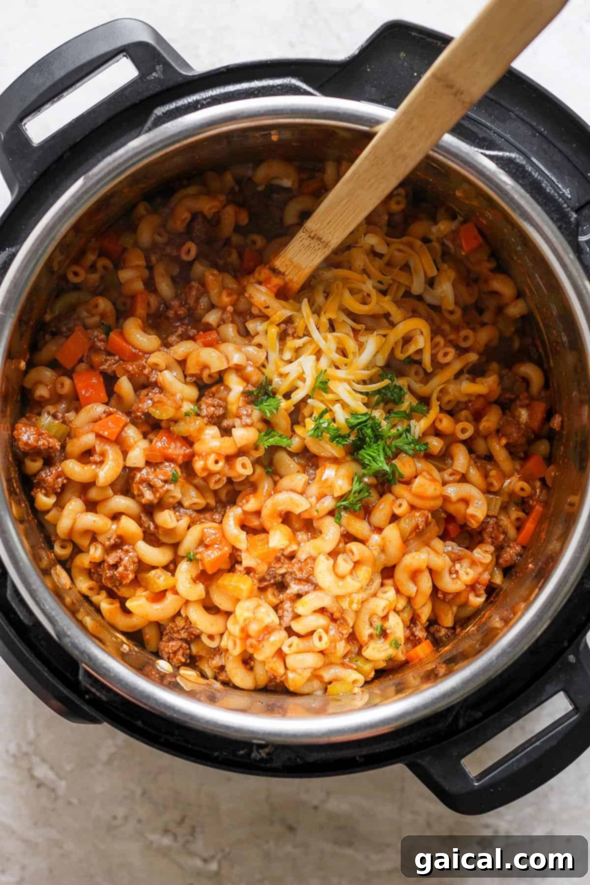 Skillet Ground Beef Pasta 2 A pot of pasta and meat in an Instant Pot, ready to be served.