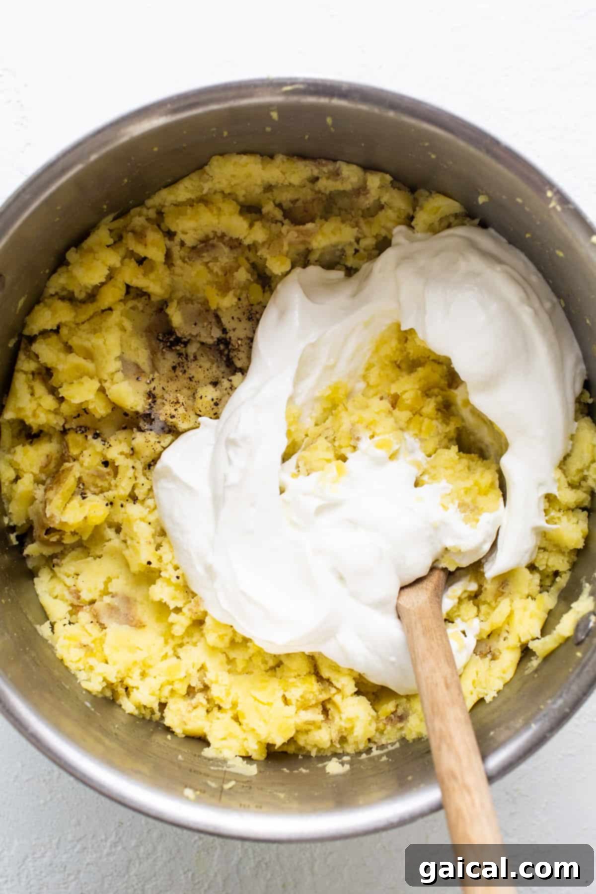Nourishing November Fit Foodie Culinary Adventures 6 A large bowl of fluffy mashed potatoes, symbolizing the delicious results of the cooking club challenge.