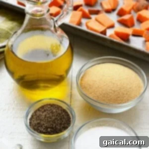 Sweet potatoes with oil, salt, and spices on a table.