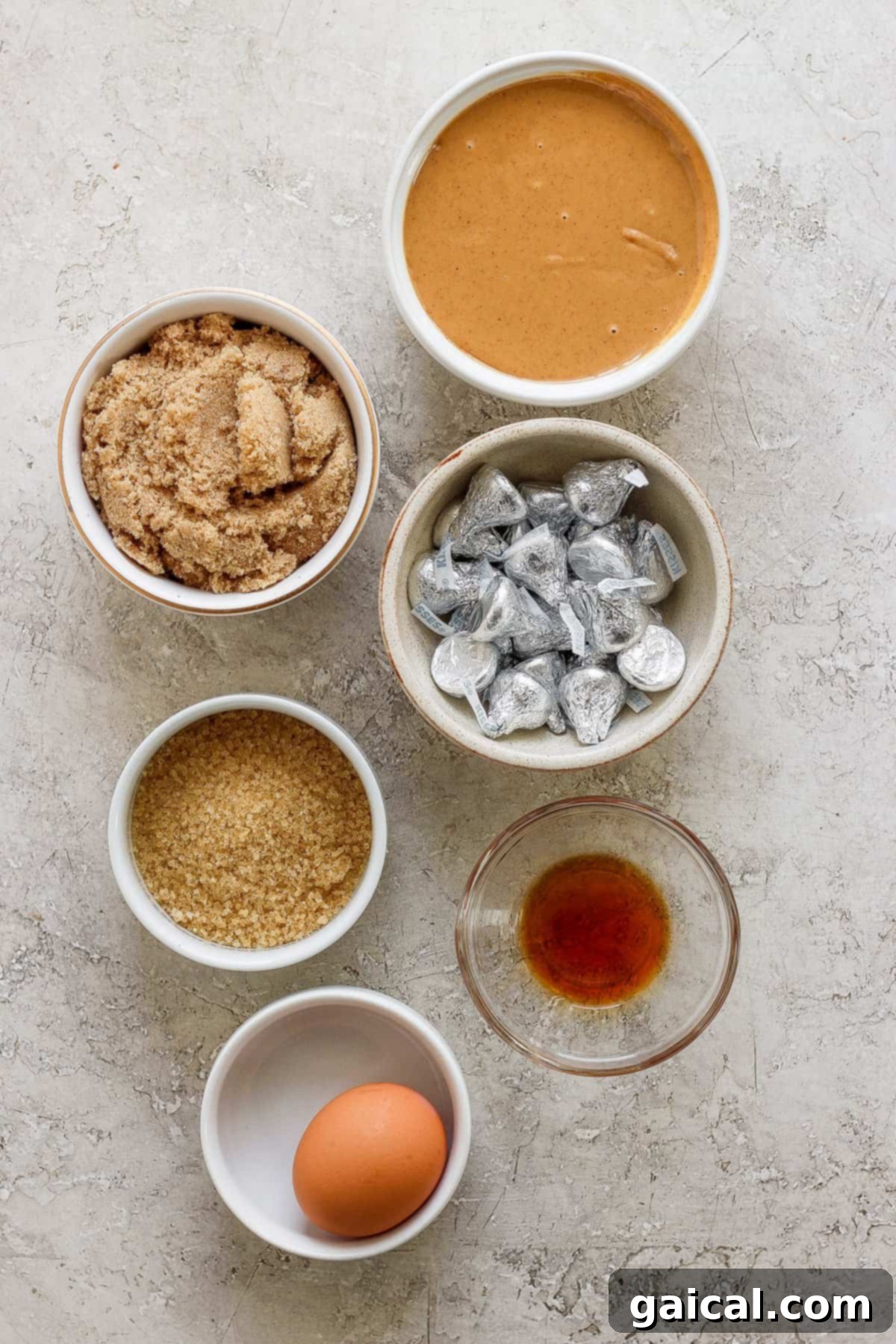 The Fit Foodie December Cooking Collective 2023 2 The simple ingredients laid out for making delicious flourless peanut butter blossom cookies.