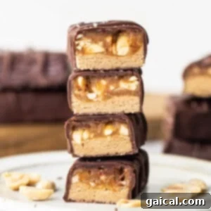 Peanut butter protein bars stacked on top of each other, showcasing their appealing layers and texture.