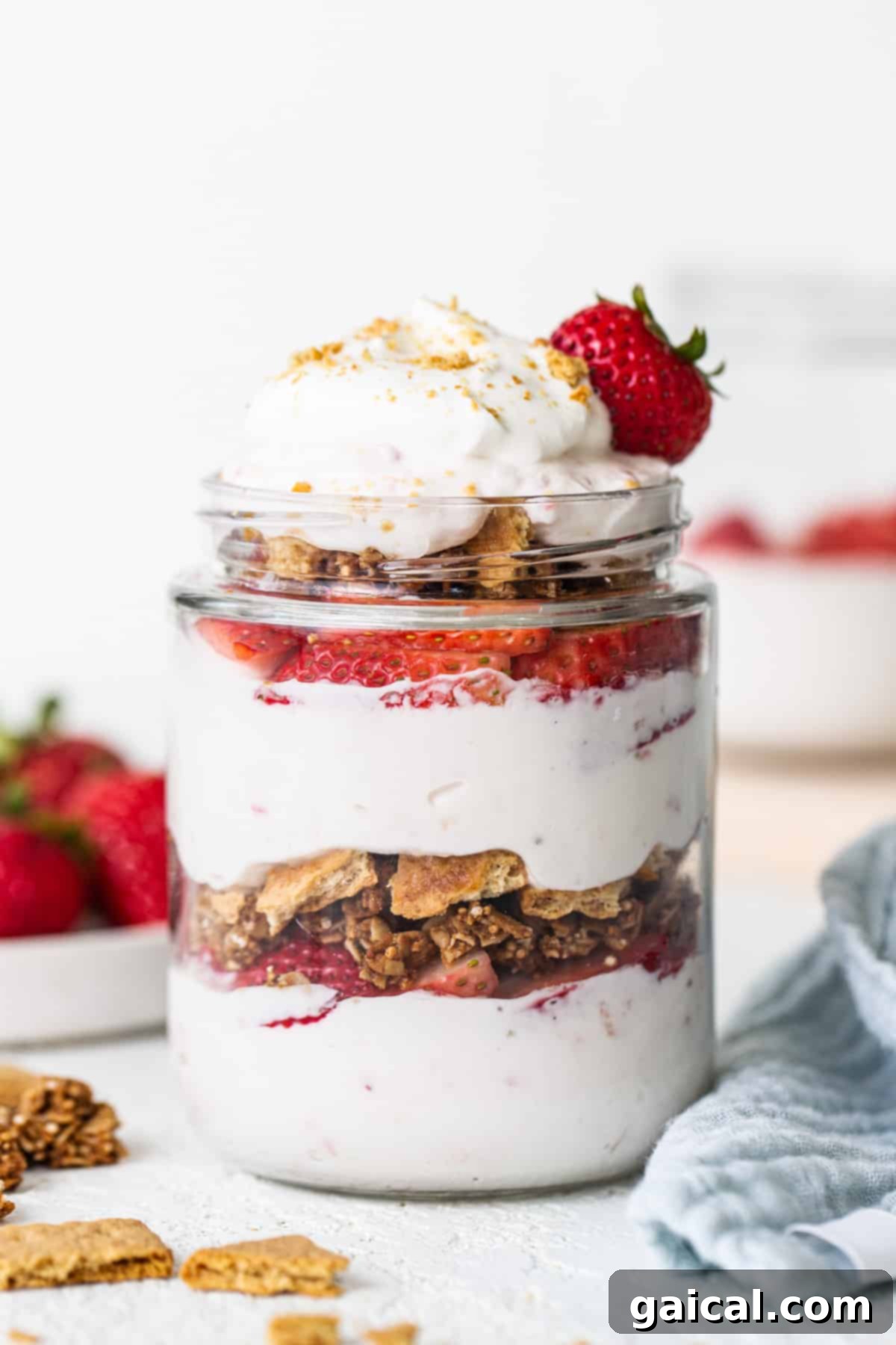 Creamy Protein Strawberry Cheesecake Jars 2 Strawberry granola parfait in a jar.