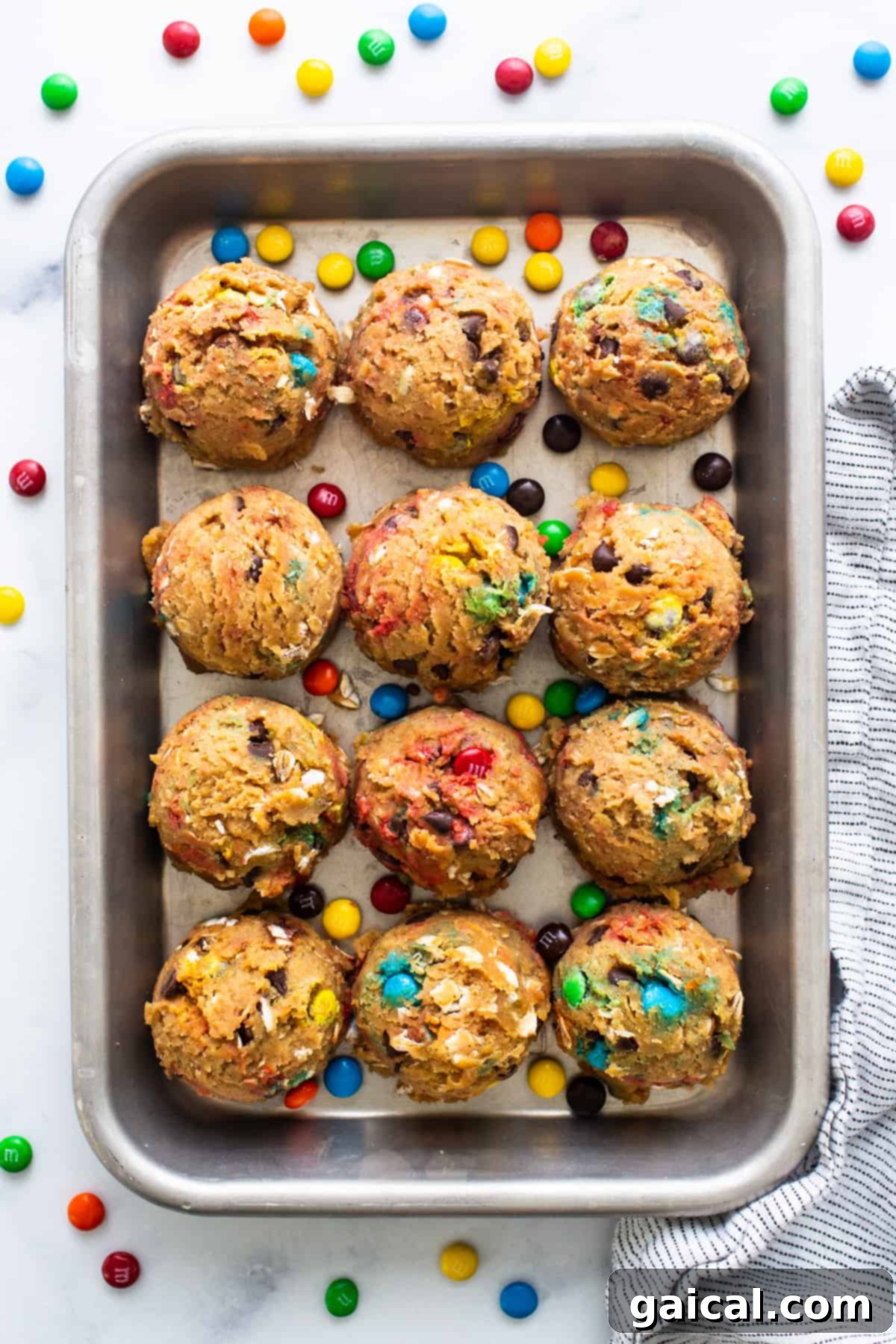 Epic Protein Cookie Dough 7 A baking pan filled with freshly baked M&M cookies, showcasing the vibrant colors.