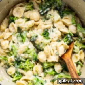 Velvety Broccoli Pasta 9 A pot of pasta with broccoli and cheese, all mixed together and ready.