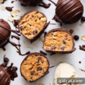 Chocolate covered peanut butter cups with a scoop of ice cream.
