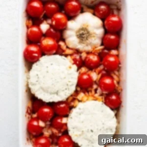 A white baking dish filled with tomatoes and cheese.