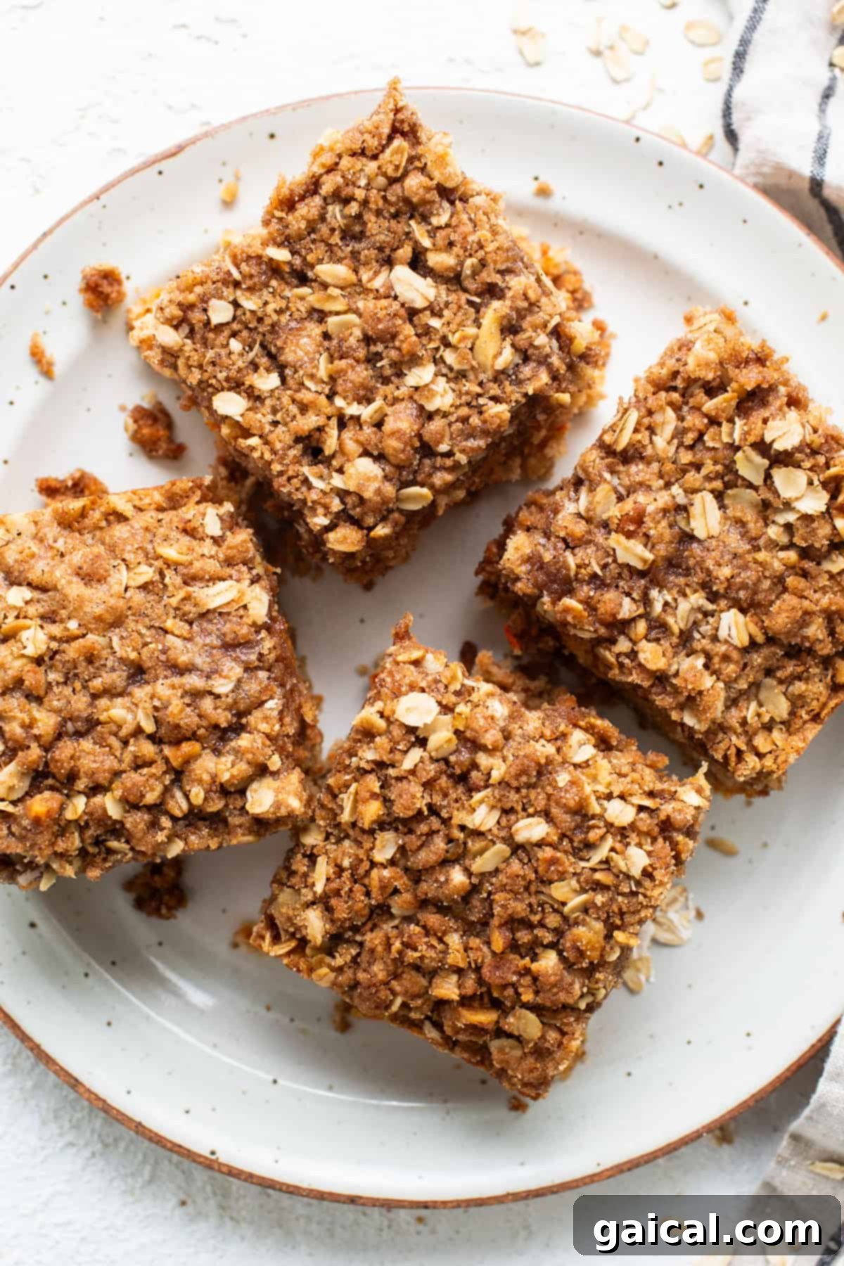 Spiced Carrot Coffee Cake 2 A beautifully baked carrot cake coffee cake, golden brown with a visible streusel topping.