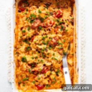 A casserole dish with a fork in it.