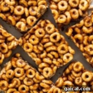 A pile of cereal bars on a white plate.