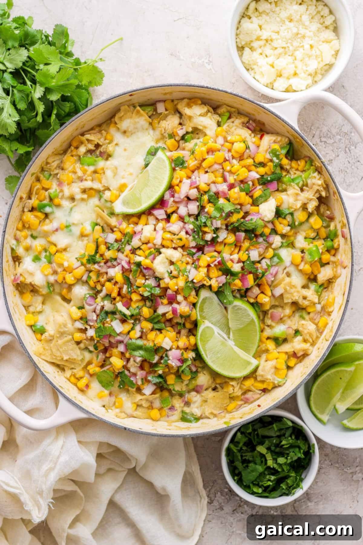 Mexican corn enchiladas in a skillet, ready to be served.